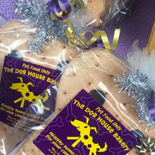 Load image into Gallery viewer, Xmas treats Christmas treats A special large bone shaped treat with carob buttons. Dogs love this treat with raw Australian peanut butter and Tasmanian Leatherwood honey.