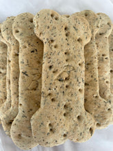 Load image into Gallery viewer, Doggy breath too much ?  Give your dog fresh breath with our mouth wash in a treat.   All natural using parsley and mint in the treat to give your dogs breath a refresh ! Ideal for middle to large size dogs.    There are 8 bones in a bag and the treats are about 12cm long   Ingredients: Wholemeal and plain flour, free-range eggs, parsley and mint.  100% Australian made product made in Tasmania.